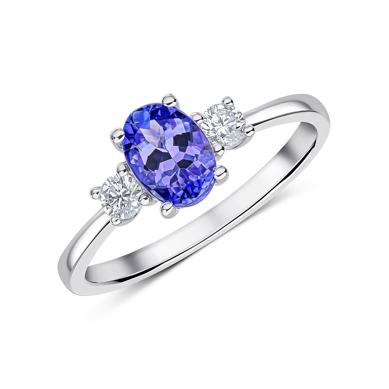 18ct White Gold Oval Tanzanite and Round Diamond Claw Three Stone Ring — 7x5mm