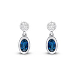 18ct White Gold Oval Natural Sapphire & Diamond Two Stone Rubover Drop Earrings — 5x3mm