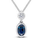 18ct White Gold Oval Natural Sapphire & Diamond Two Stone Rubover Slider Pendant — 6x4mm