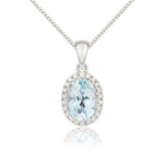 18ct White Gold Oval Natural Aquamarine & Diamond Claw Set Cluster Pendant — 7x5mm