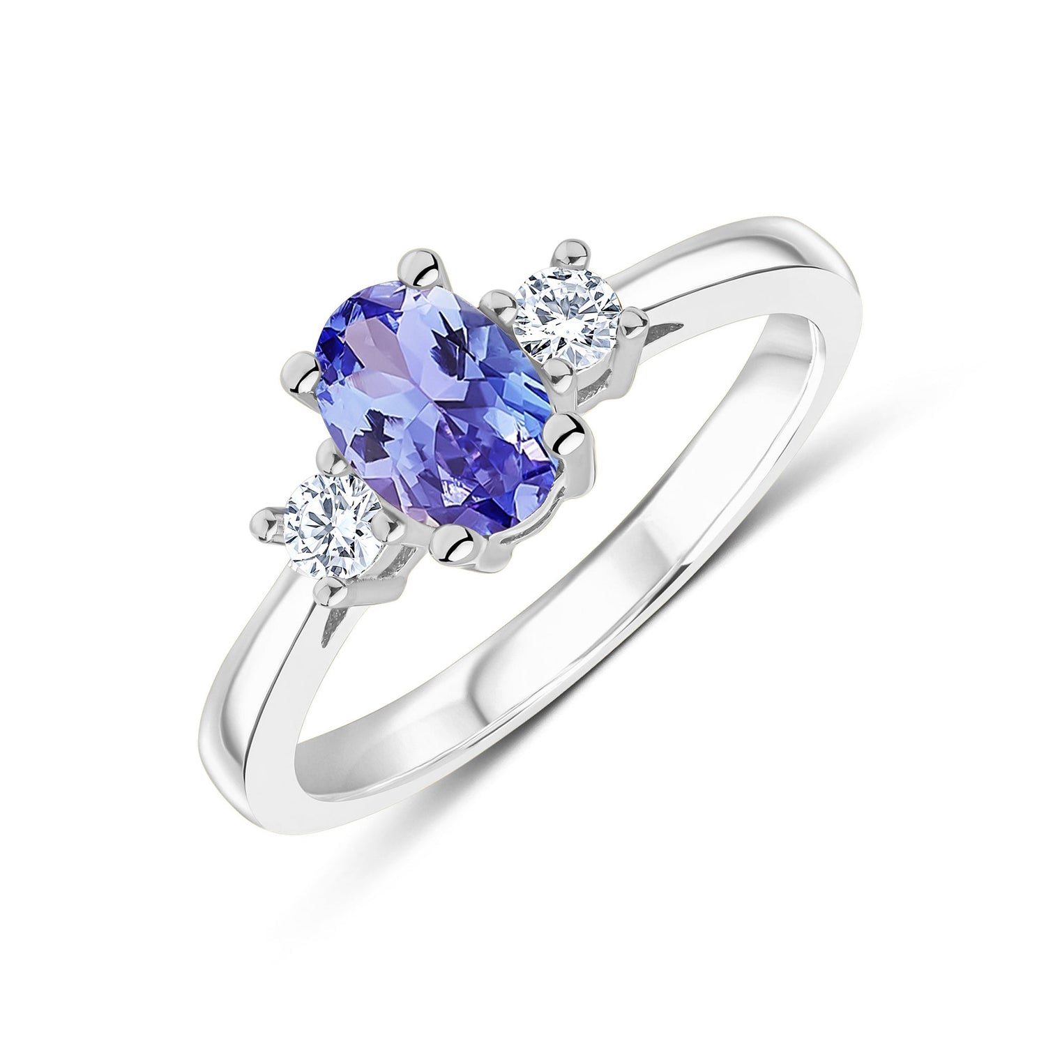 9ct White Gold Oval Natural Tanzanite and Round Diamond Three Stone Ring — 7x5mm