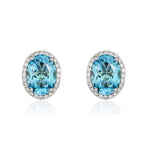 9ct White Gold Oval Natural Swiss Blue Topaz & Diamond Claw Set Cluster Stud Earrings — 8x6mm