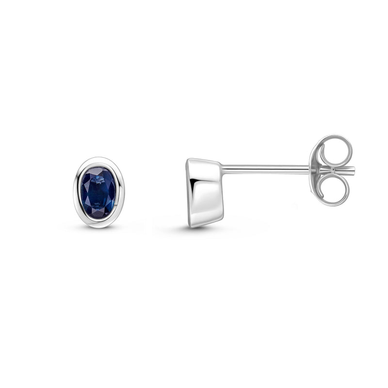 9ct White Gold Oval Natural Sapphire Rubover Stud Earrings — 4x3mm