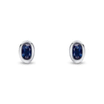9ct White Gold Oval Natural Sapphire Rubover Stud Earrings — 5x3mm