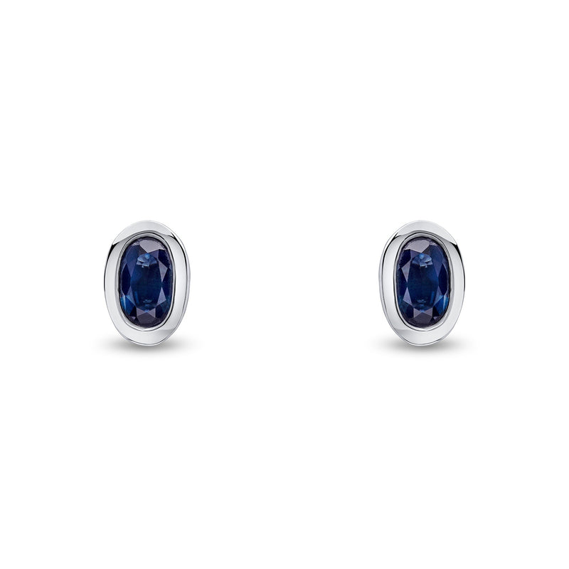 9ct White Gold Oval Natural Sapphire Rubover Stud Earrings — 5x3mm