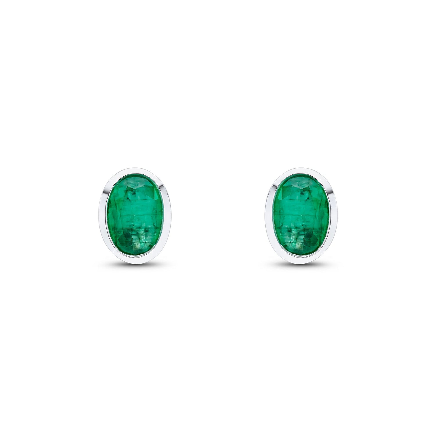 9ct White Gold Oval Natural Emerald Rubover Stud Earrings — 7x5mm