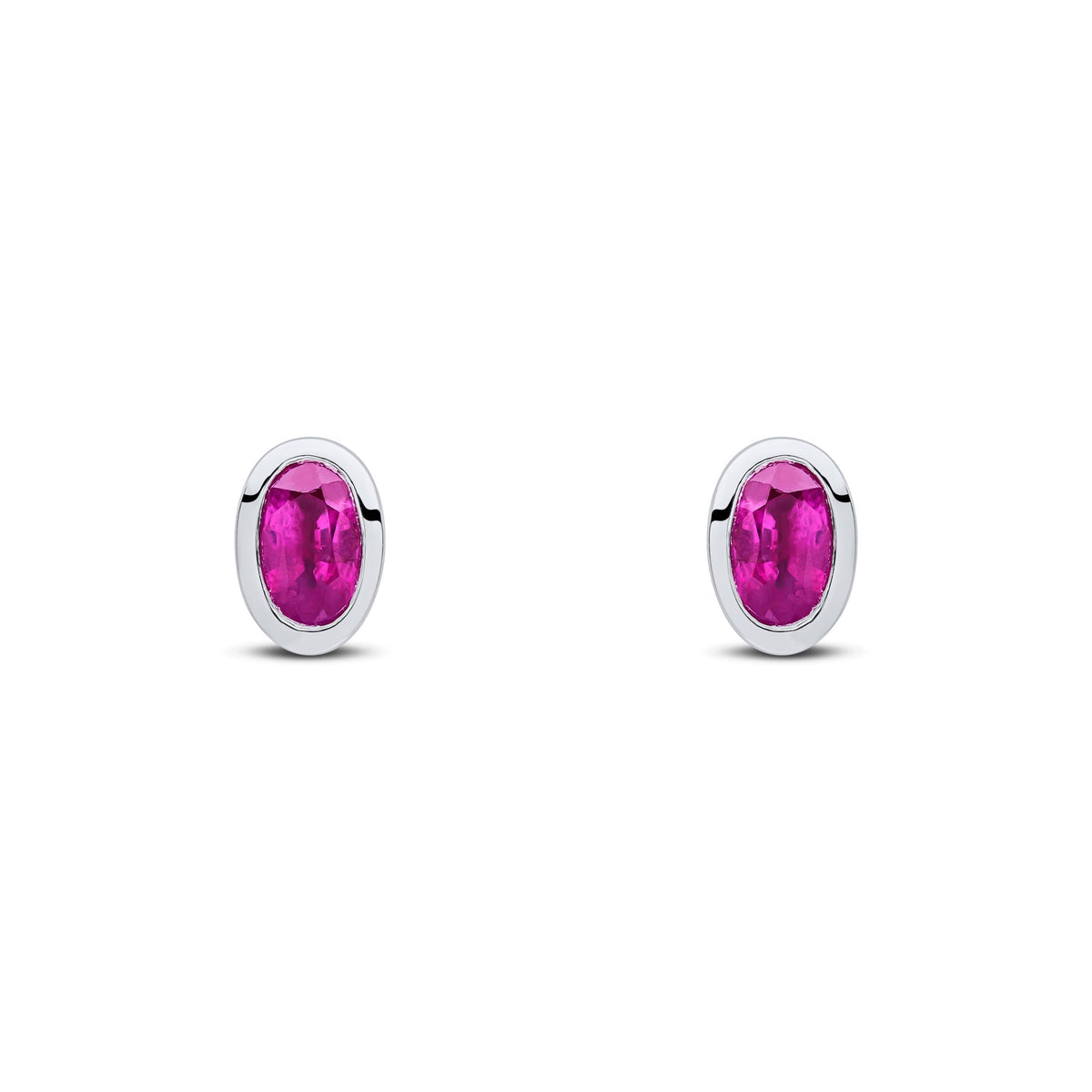 9ct White Gold Oval Natural Ruby Rubover Stud Earrings — 5x3mm