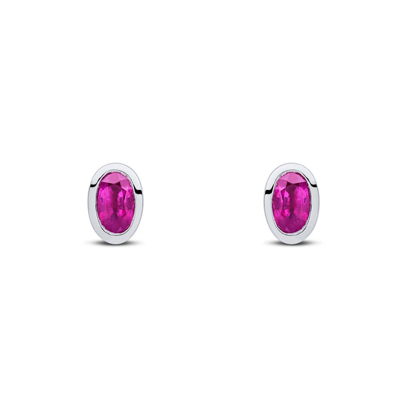 9ct White Gold Oval Natural Ruby Rubover Stud Earrings — 5x3mm