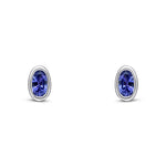 9ct White Gold Oval Natural Tanzanite Rubover Stud Earrings — 5x3mm