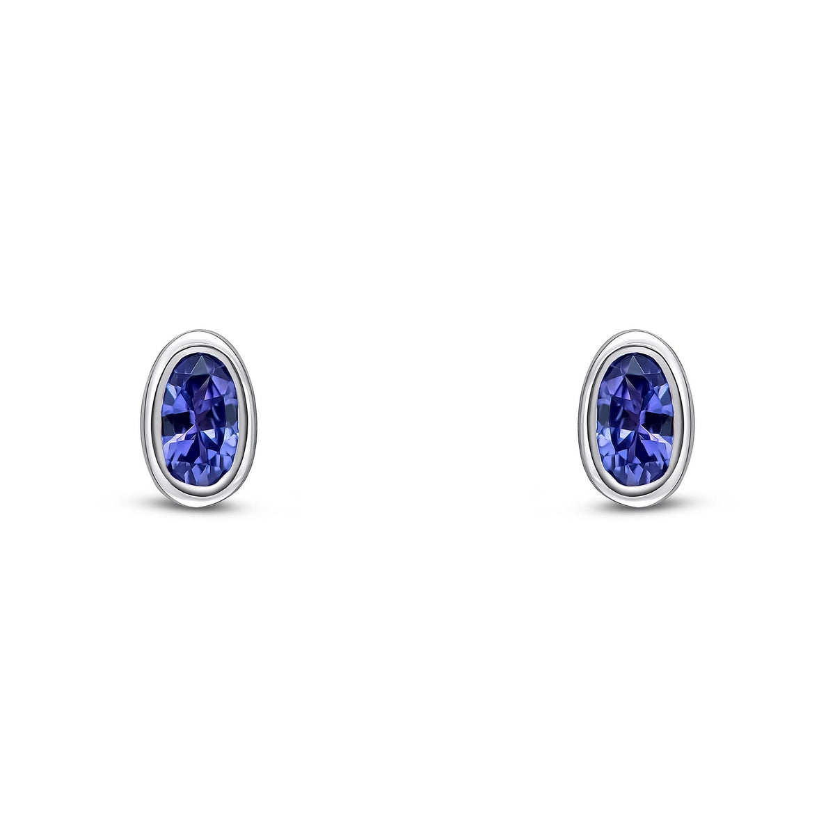9ct White Gold Oval Natural Tanzanite Rubover Stud Earrings — 5x3mm