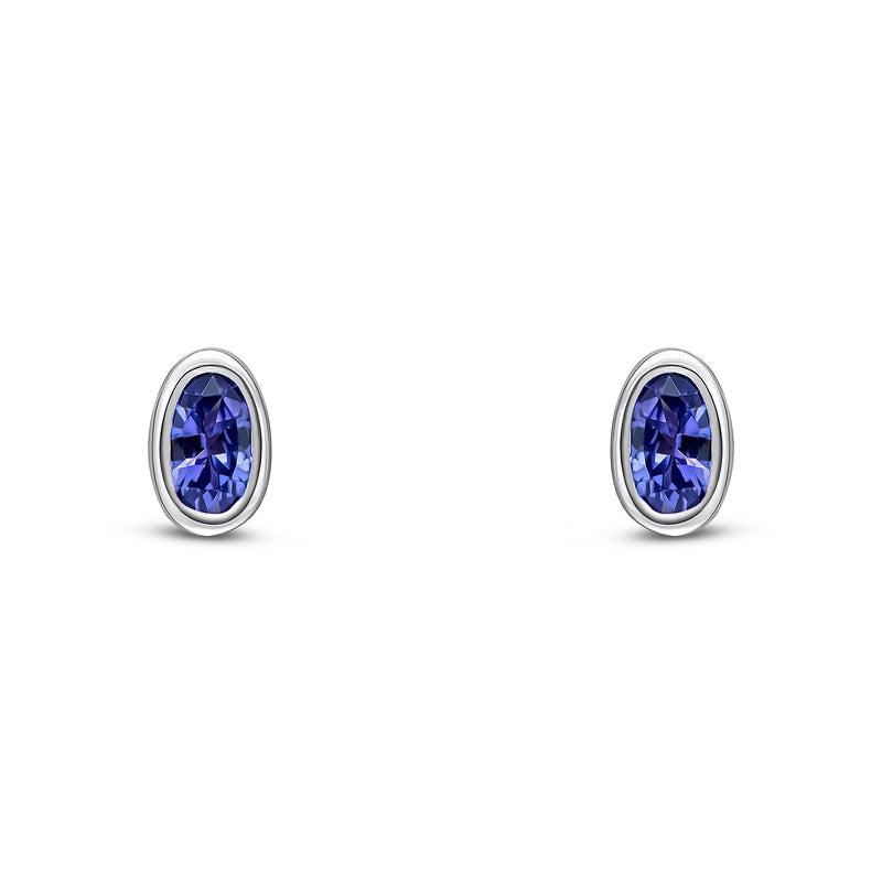 9ct White Gold Oval Natural Tanzanite Rubover Stud Earrings — 5x3mm