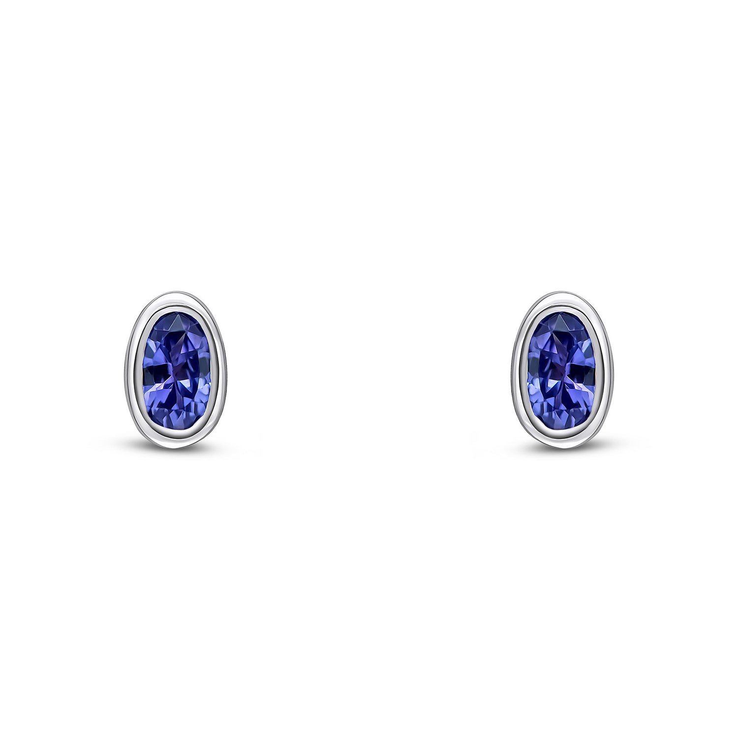 9ct White Gold Oval Natural Tanzanite Rubover Stud Earrings — 5x3mm