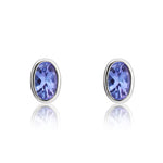 9ct White Gold Oval Natural Tanzanite Rubover Stud Earrings — 4x3mm