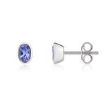 9ct White Gold Oval Natural Tanzanite Rubover Stud Earrings — 4x3mm