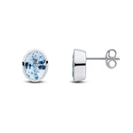 9ct White Gold Oval Natural Aquamarine Rubover Stud Earrings — 8x6mm