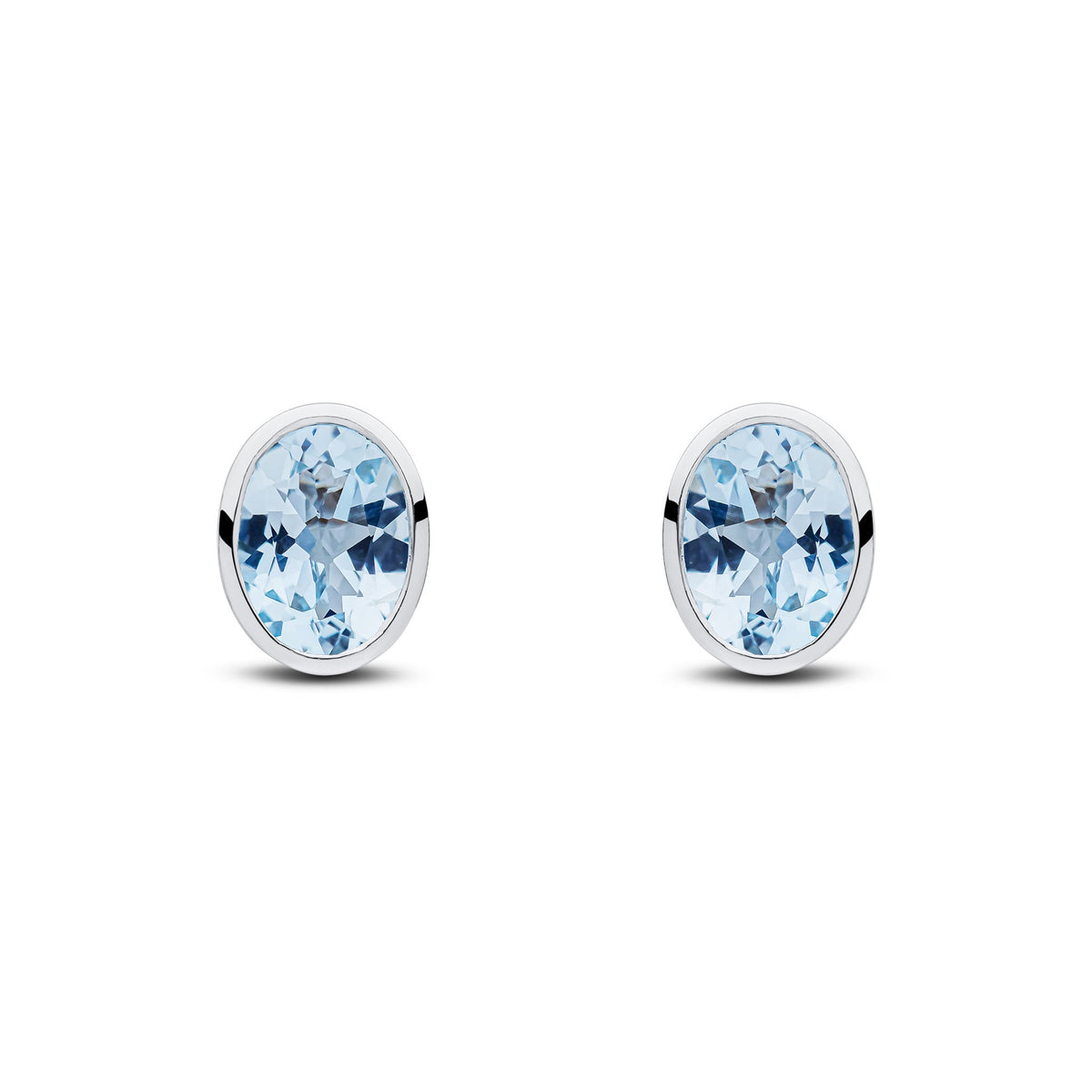 9ct White Gold Oval Natural Aquamarine Rubover Stud Earrings — 8x6mm
