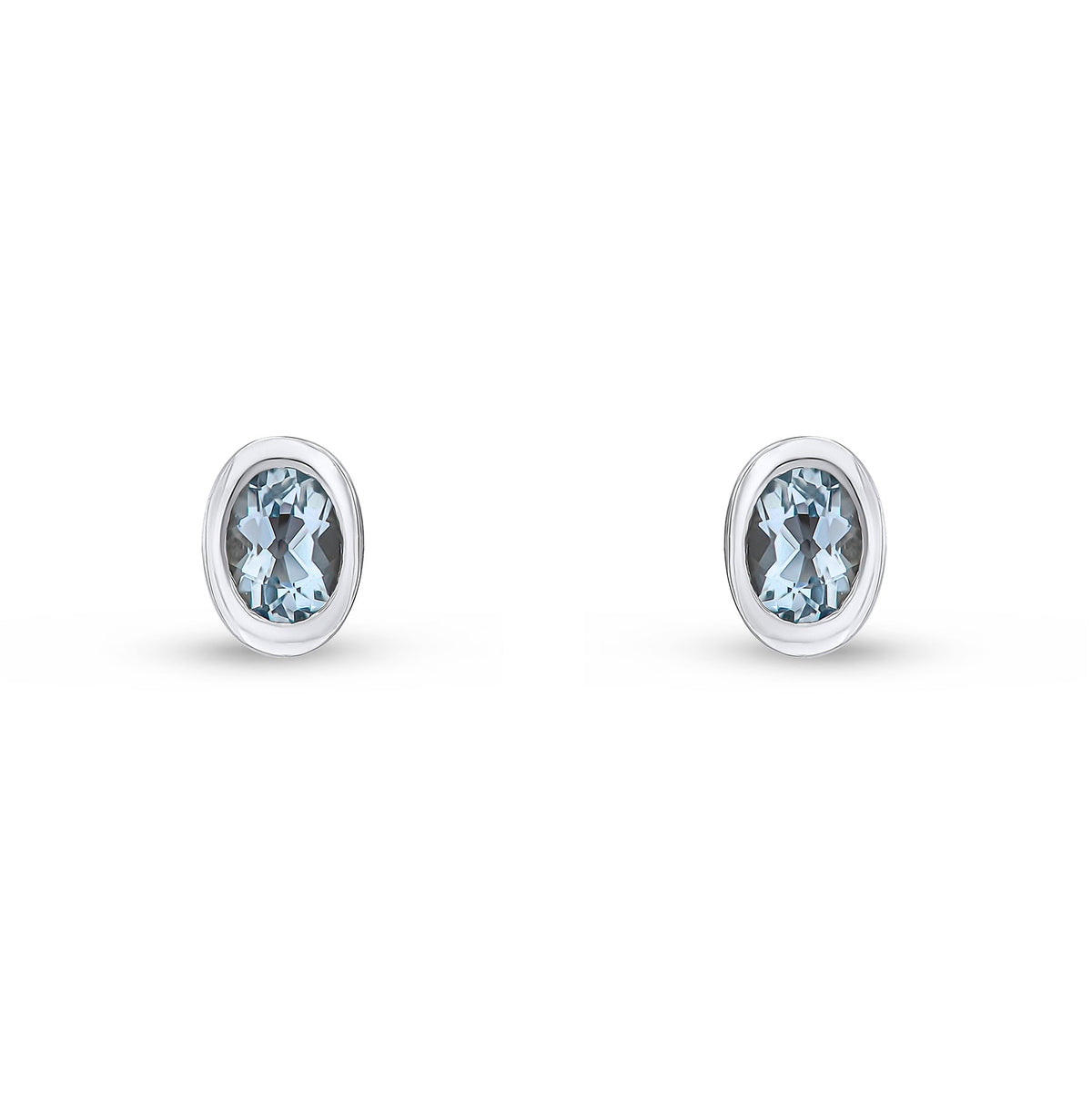 9ct White Gold Oval Natural Aquamarine Rubover Stud Earrings — 4x3mm