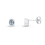 9ct White Gold Oval Natural Aquamarine Rubover Stud Earrings — 4x3mm