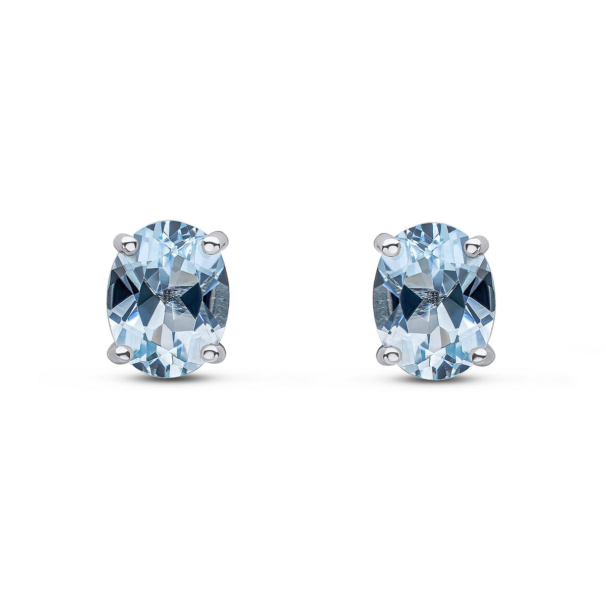 9ct White Gold Oval Natural Aquamarine Claw Stud Earrings — 8x6mm