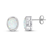 9ct White Gold Oval Natural Opal Rubover Stud Earrings — 9x7mm