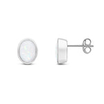 9ct White Gold Oval Natural Opal Rubover Stud Earrings — 8x6mm