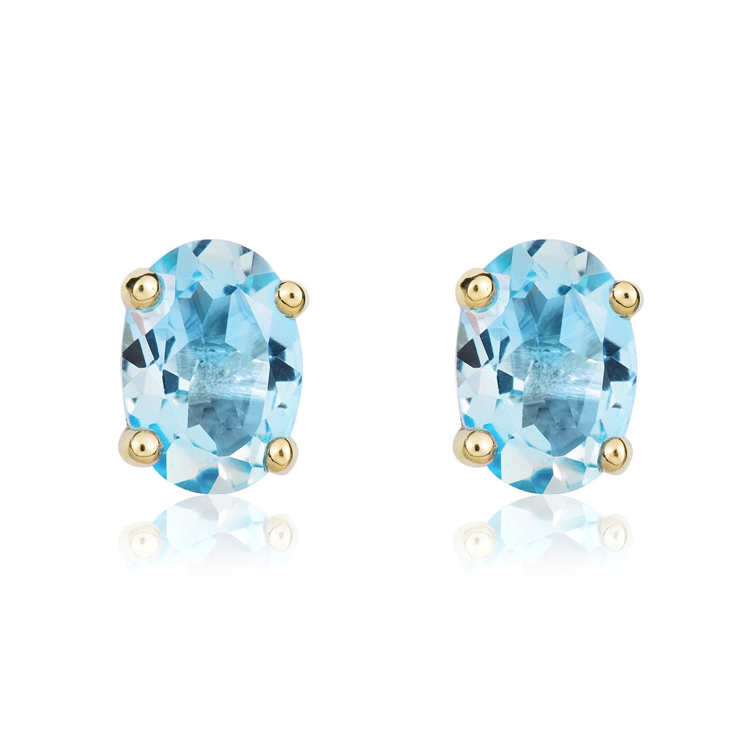 9ct Yellow Gold Oval Natural Swiss Blue Topaz Claw Set Stud Earrings — 7x5mm