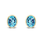 9ct Yellow Gold Oval Natural Swiss Blue Topaz Rubover Stud Earrings — 9x7mm
