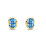 9ct Yellow Gold Oval Natural Swiss Blue Topaz Rubover Stud Earrings — 4x3mm