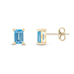 9ct Yellow Gold Octagonal Emerald Cut Natural Swiss Blue Topaz Claw Stud Earrings — 6x4mm
