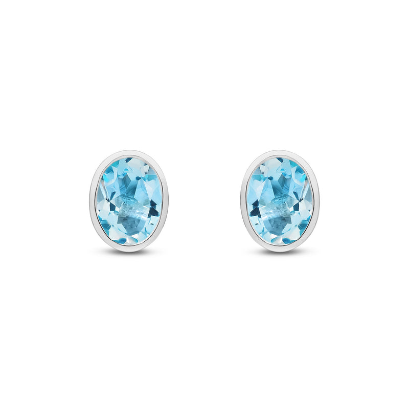 9ct White Gold Oval Natural Swiss Blue Topaz Rubover Stud Earrings — 8x6mm