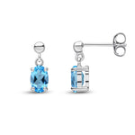 9ct White Gold Oval Natural Swiss Blue Topaz Claw Drop Earrings with Bead Top — 6x4mm