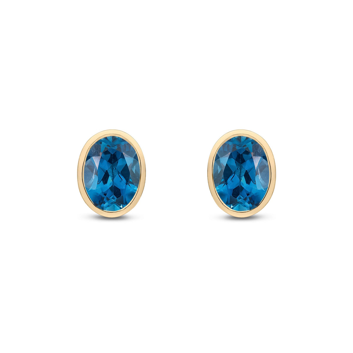 9ct Yellow Gold Oval Natural London Blue Topaz Rubover Stud Earrings — 8x6mm