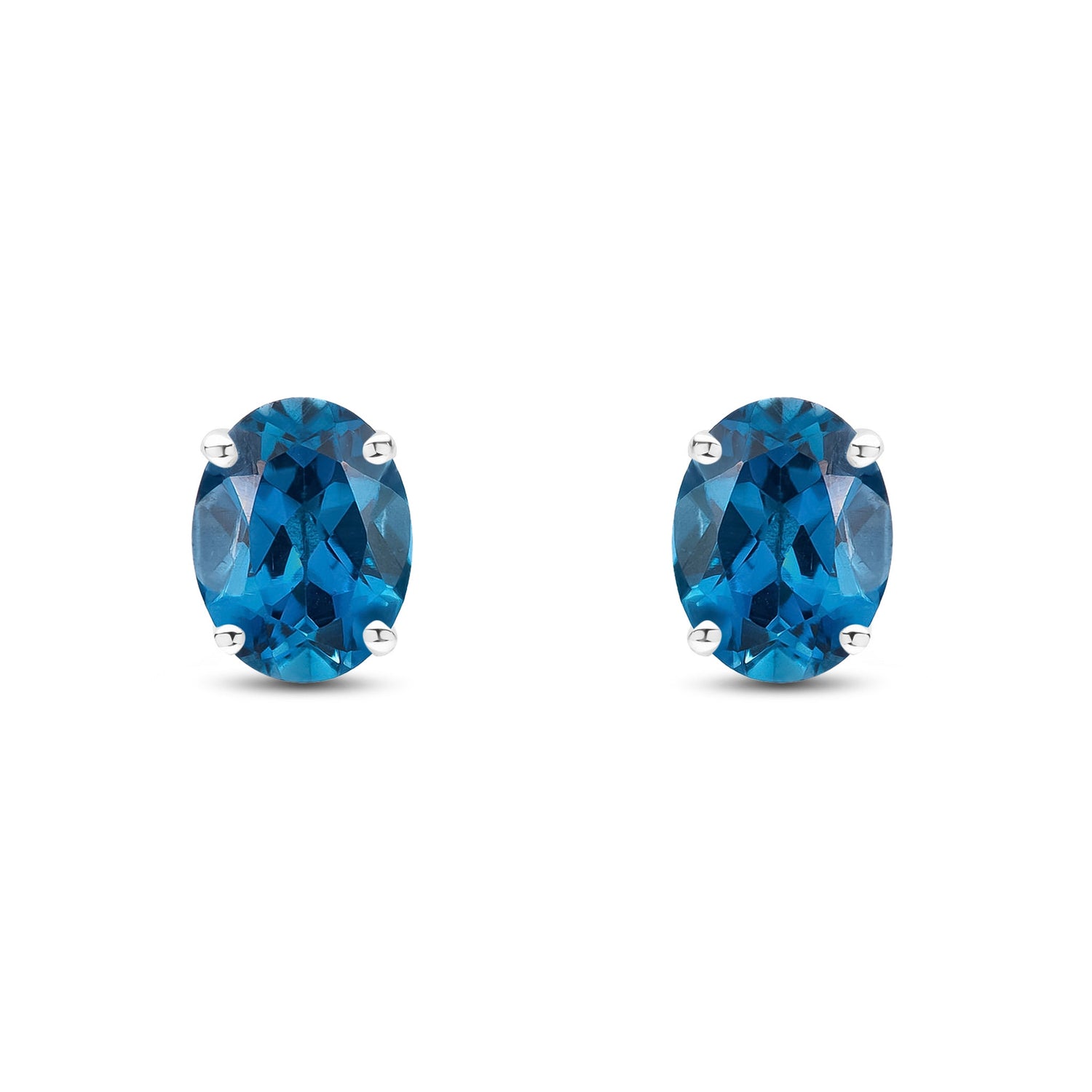 9ct White Gold Oval Natural London Blue Topaz Claw Set Stud Earrings — 8x6mm