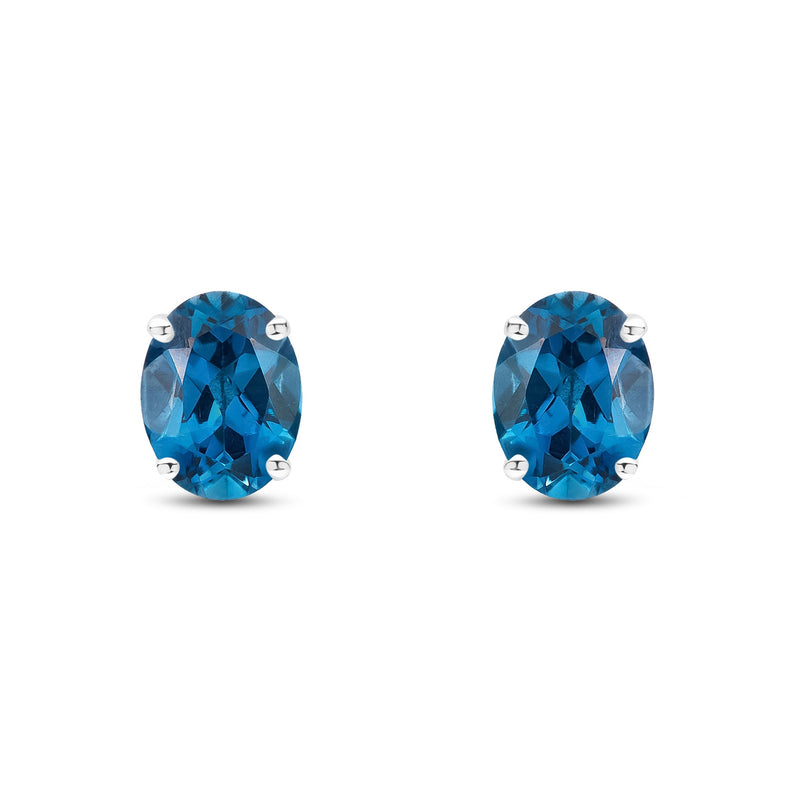 9ct White Gold Oval Natural London Blue Topaz Claw Stud Earrings — 8x6mm