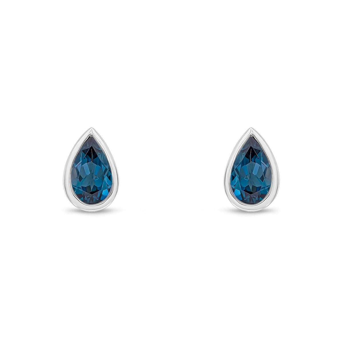 9ct White Gold Pear Shaped Natural London Blue Topaz Rubover Stud Earrings — 5x3mm