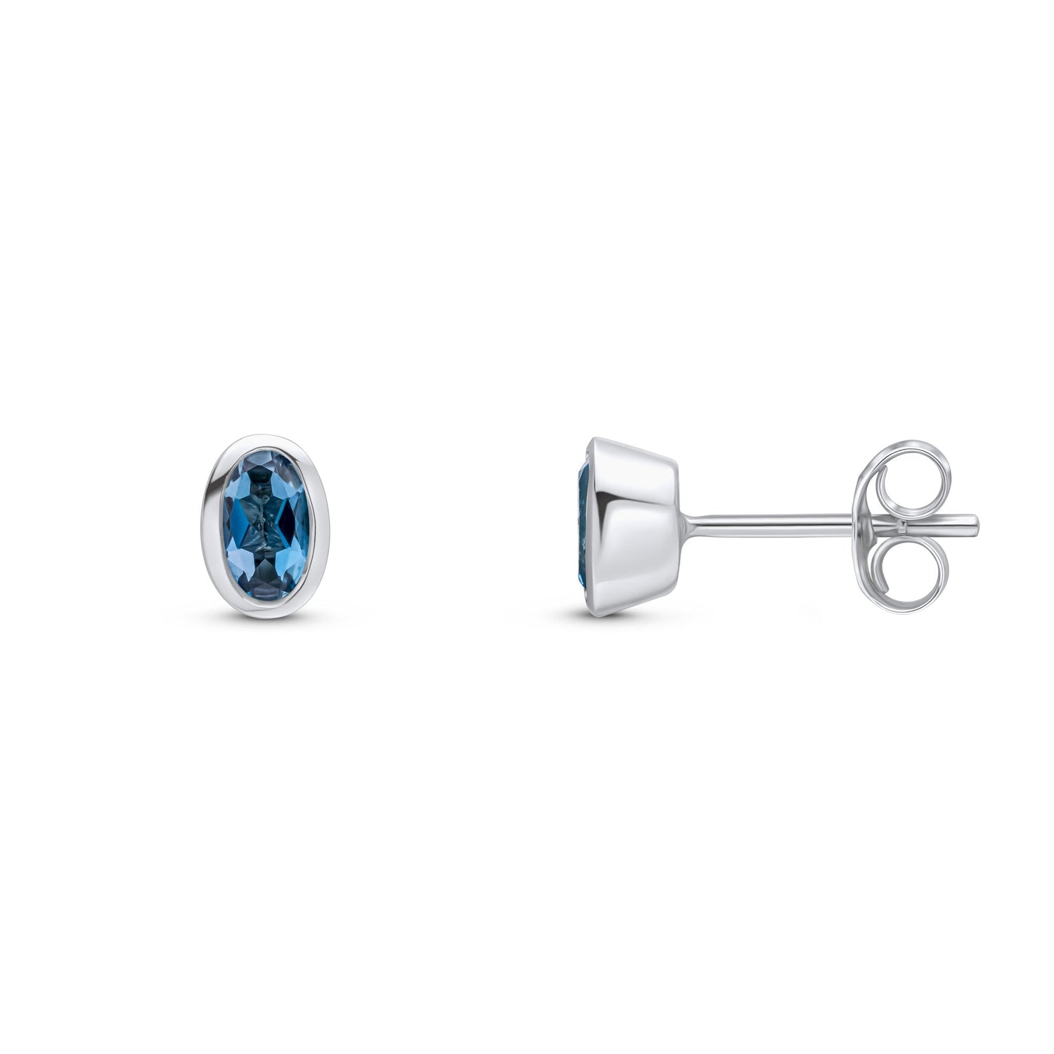 9ct White Gold Oval Natural London Blue Topaz Rubover Stud Earrings — 5x3mm