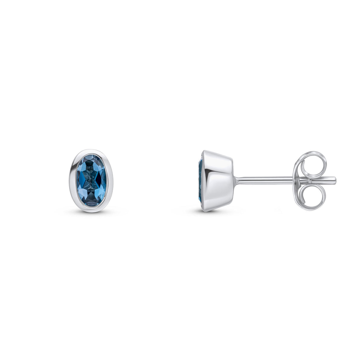 9ct White Gold Oval Natural London Blue Topaz Rubover Stud Earrings — 5x3mm