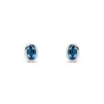 9ct White Gold Oval Natural London Blue Topaz Rubover Stud Earrings — 5x3mm