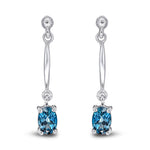 9ct White Gold Oval Natural London Blue Topaz Claw Bar Drop Earrings — 6x4mm