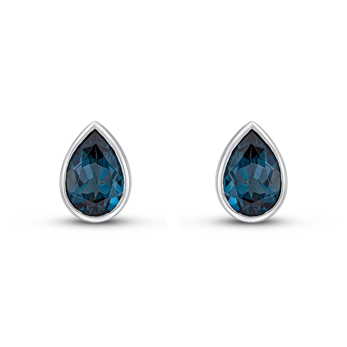 9ct White Gold Pear Shaped Natural London Blue Topaz Rubover Stud Earrings — 9x6mm