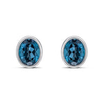 9ct White Gold Oval Natural London Blue Topaz Rubover Stud Earrings — 9x7mm