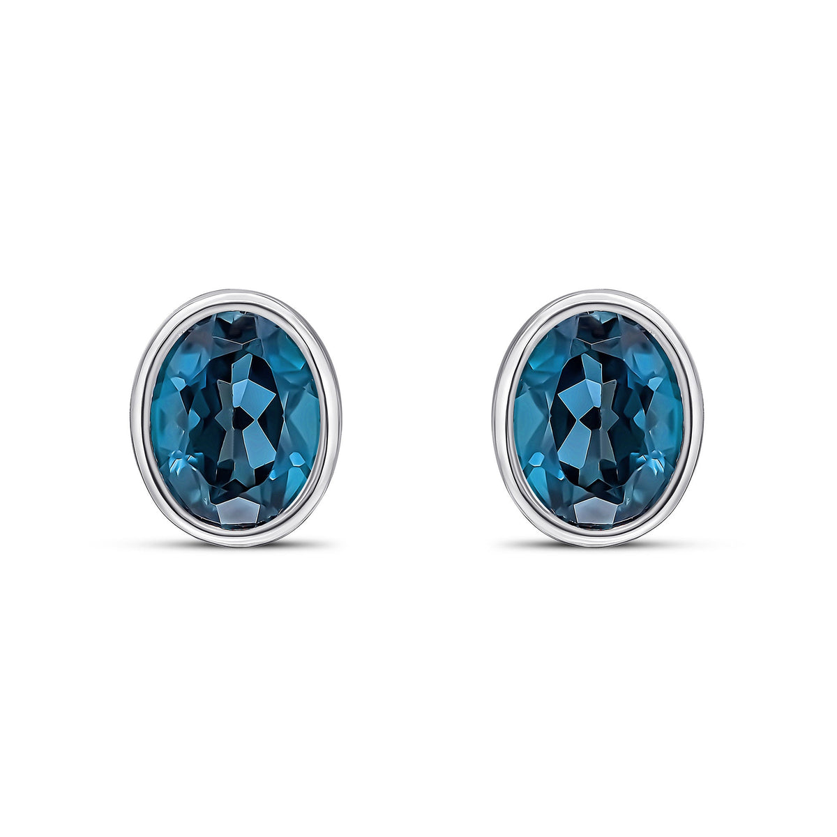 9ct White Gold Oval Natural London Blue Topaz Rubover Stud Earrings — 9x7mm
