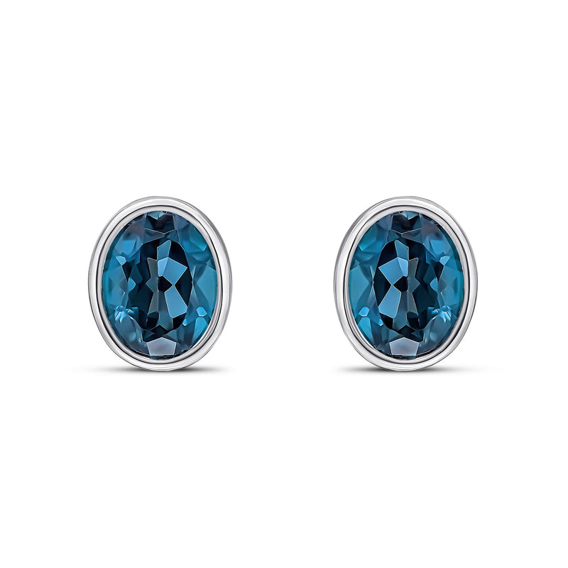 9ct White Gold Oval Natural London Blue Topaz Rubover Stud Earrings — 9x7mm