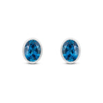 9ct White Gold Oval Natural London Blue Topaz Rubover Stud Earrings — 8x6mm