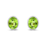 9ct White Gold Oval Natural Peridot Rubover Stud Earrings — 9x7mm