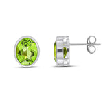 9ct White Gold Oval Natural Peridot Rubover Stud Earrings — 9x7mm
