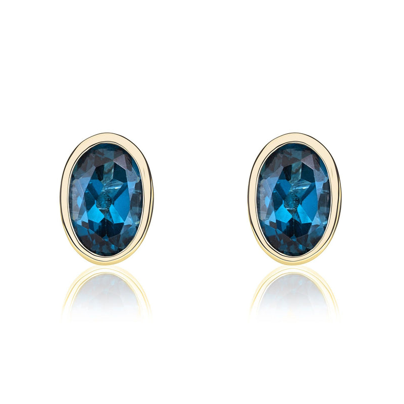 9ct Yellow Gold Oval Natural London Blue Topaz Rubover Stud Earrings — 6x4mm