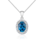 9ct White Gold Oval Natural London Blue Topaz & Diamond Halo Cluster Pendant — 7x5mm