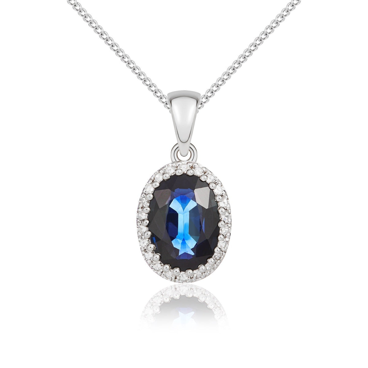9ct White Gold Oval Natural Sapphire & Diamond Claw Set Cluster Pendant — 7x5mm