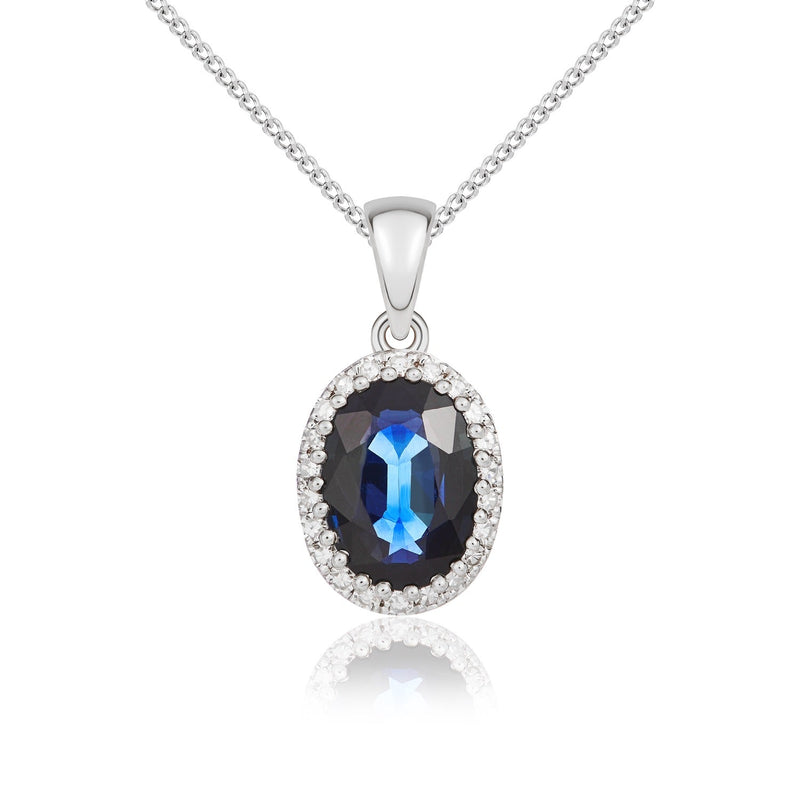 9ct White Gold Oval Natural Sapphire & Diamond Claw Set Cluster Pendant — 7x5mm